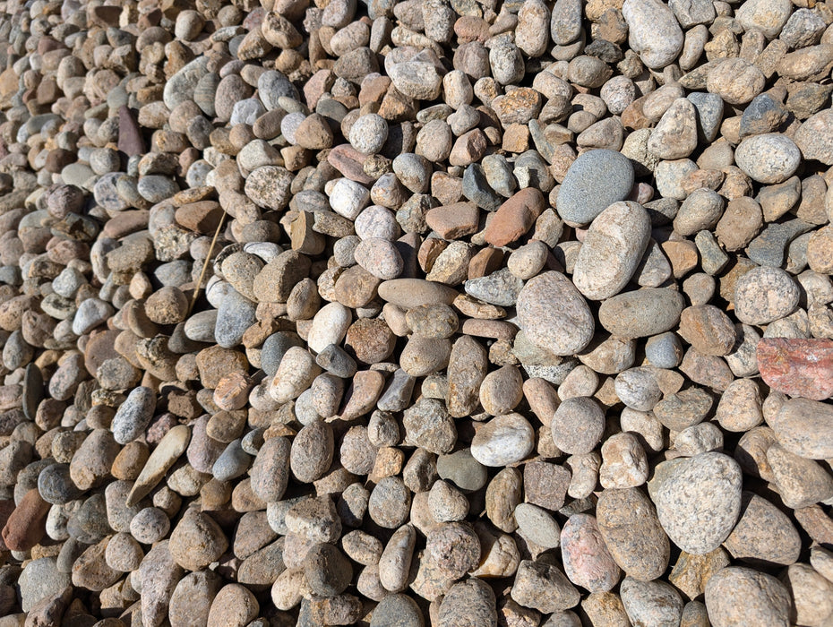 1.5 Local River Rock - Per 1 Ton